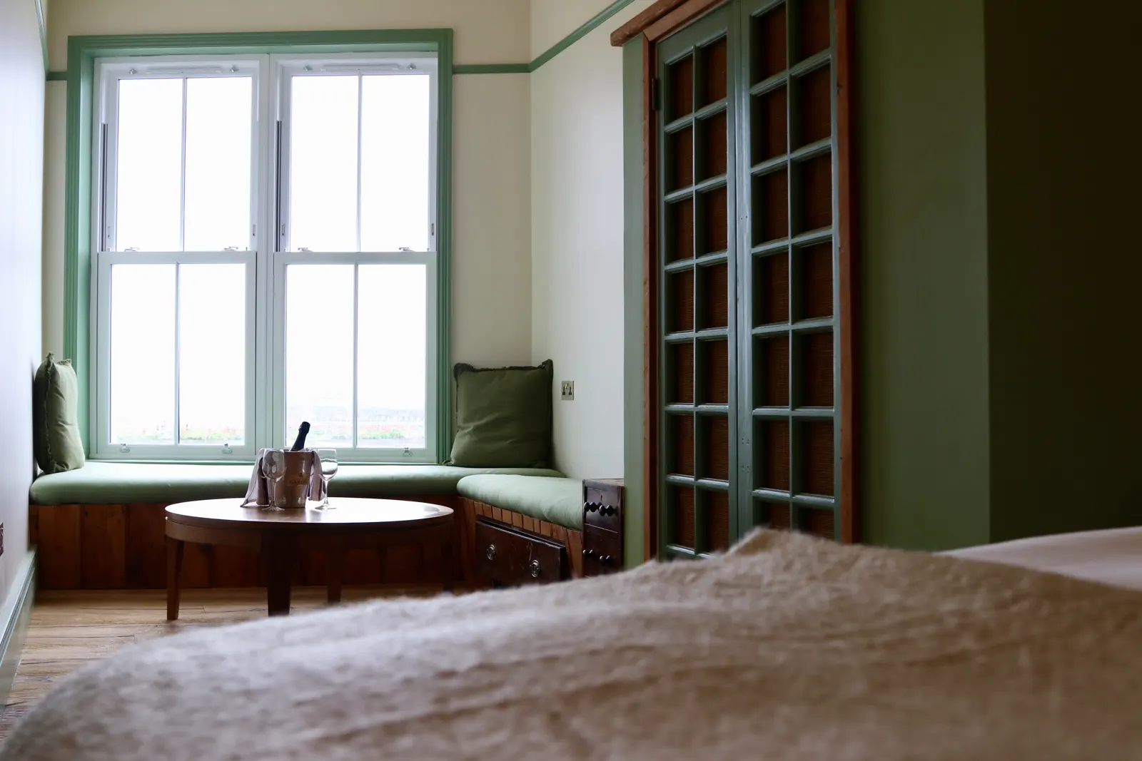 A London & Paris bedroom with a bay window