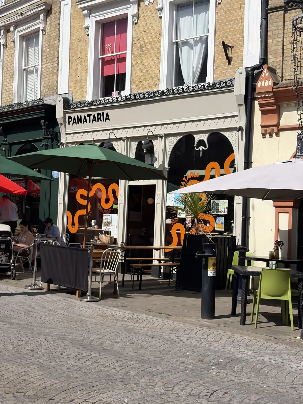 Outdoor seating with parasols on the square