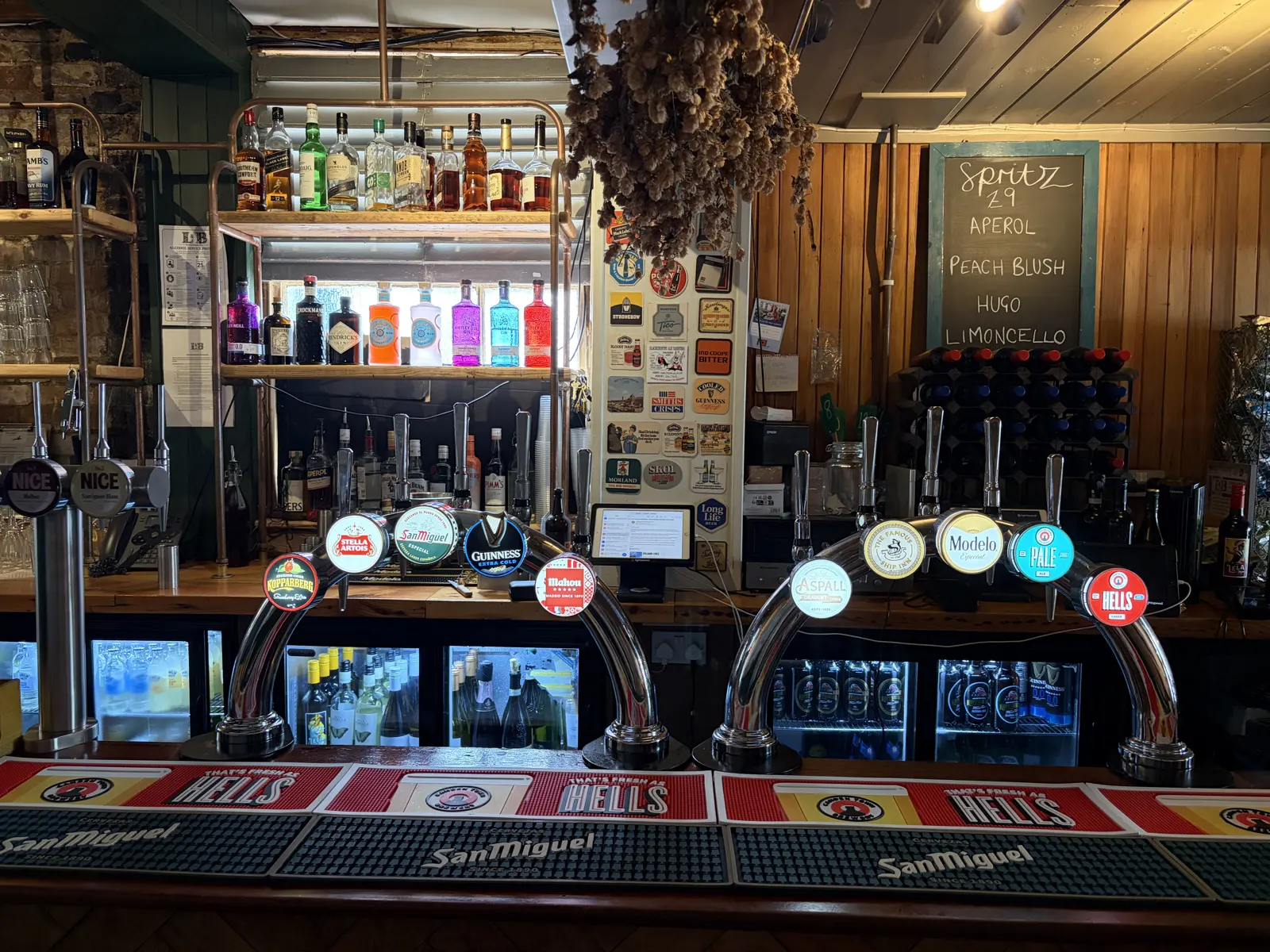 Beer taps on the bar at The Ship Inn